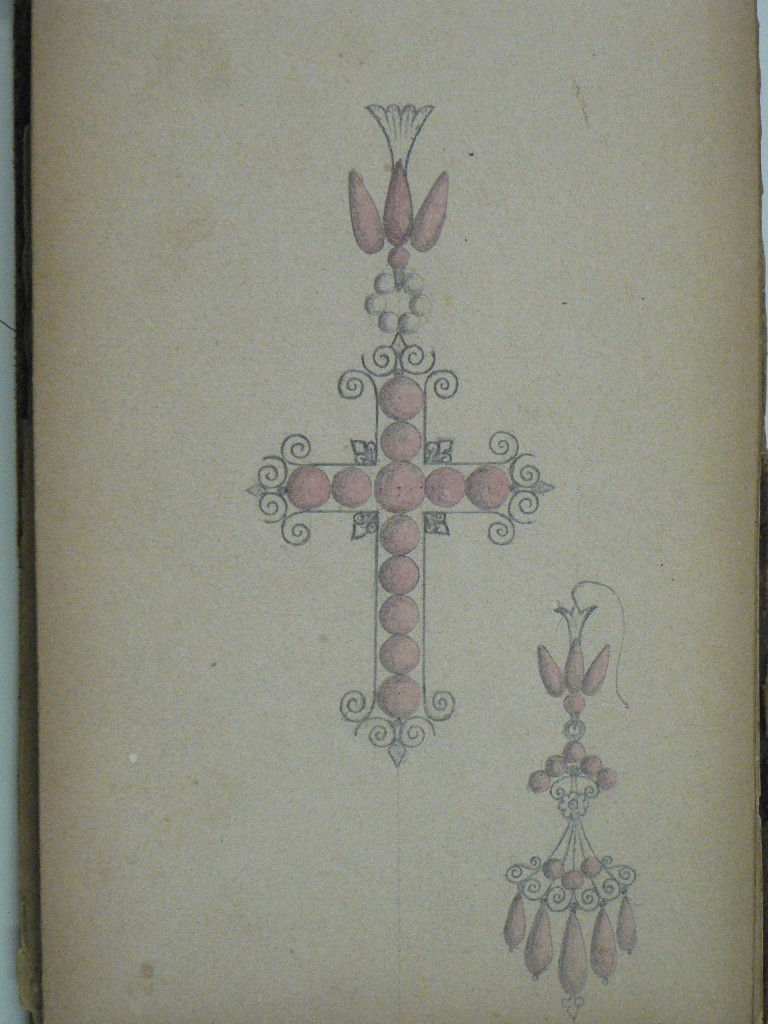 Modèle de croix de Perpignan et de boucle d'oreille en grenat, versd 1860-1870.