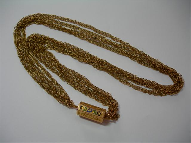 Collier or jaune, vente à Nîmes, aout 2009.