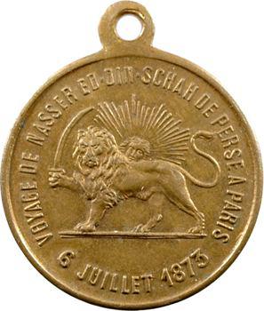 VOYAGE DE NASSER ED. DIN. SCHAH DE PERSE A PARIS// 6 JUILLET 1873. Le lion d'Iran tenant une épée de la patte droite ; derrière lui, un soleil rayonnant.  Bronze. 4,90 g. 23,0 mm.